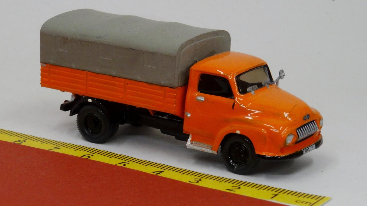 Betriebsfahrzeug Eigenbau: Ford FK Pritsche Plane orange